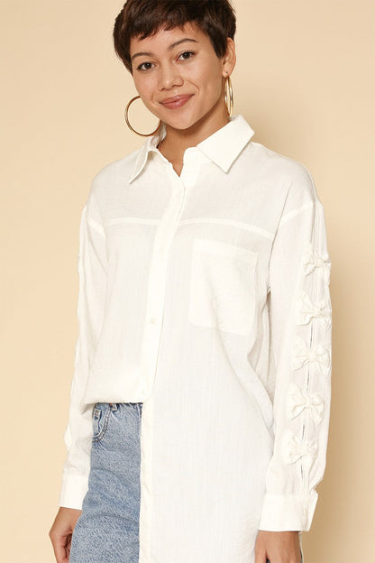 Aveline – chemise blanche à nœuds aux manches, vue de face