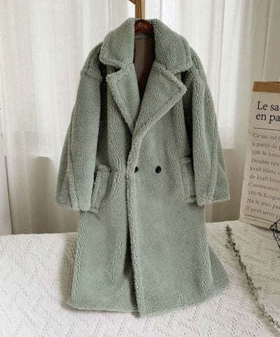 Kadiatou – Manteau en laine d’agneau à poches ❄️🧥